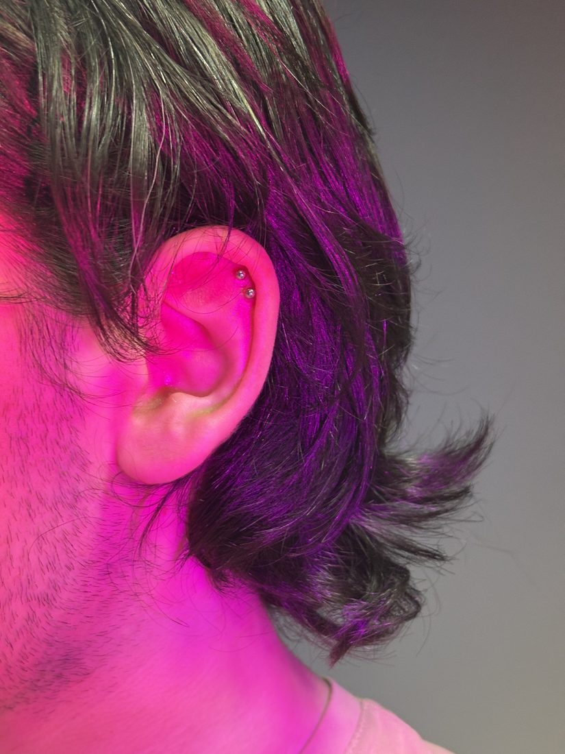 double helix studs under pink uv light
